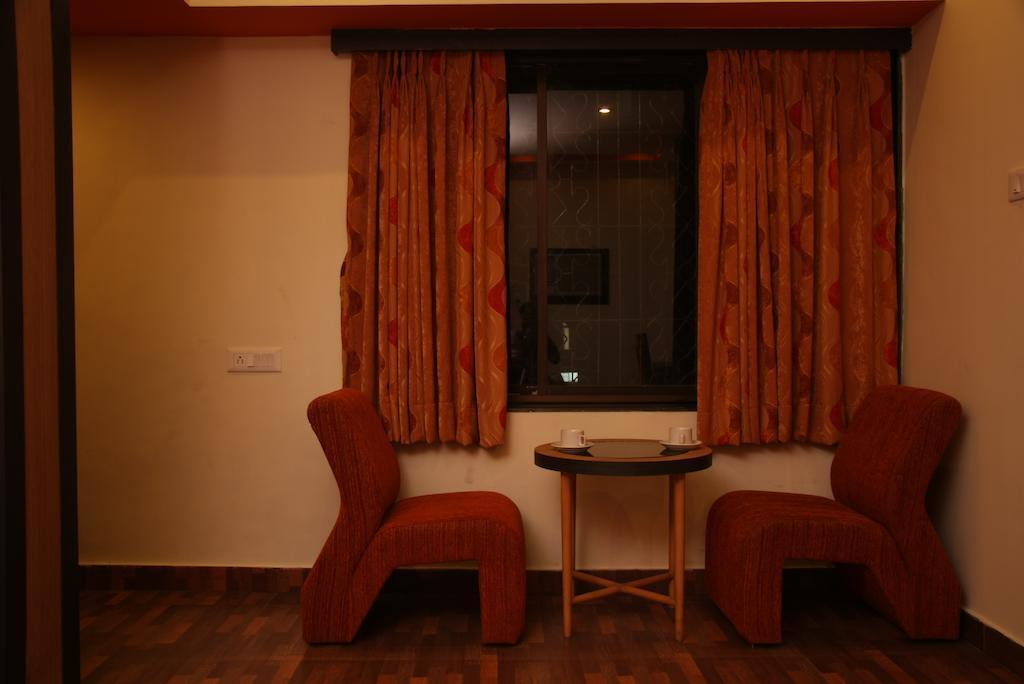 Hotel Trimoorti Calcutá Quarto foto